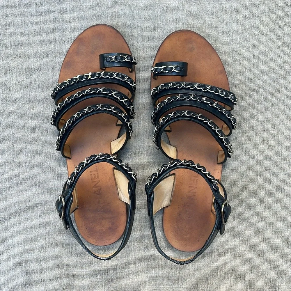 CHANEL Strappy Flat Sandal in Black Leather and Silver Chain Detail